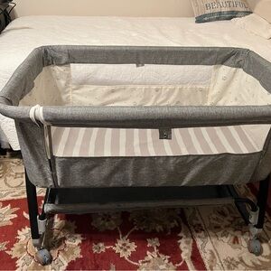 Gray and White Baby Bassinet